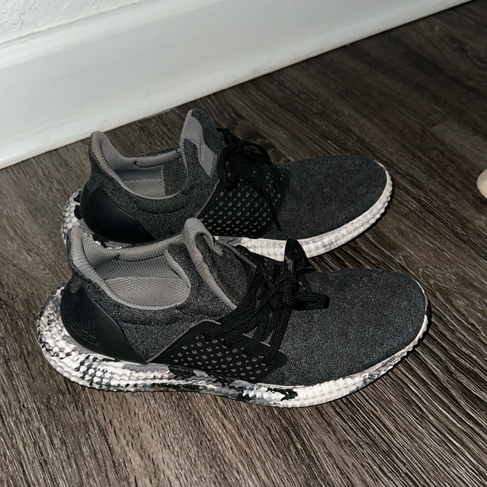 gently worn light adidas running shoe